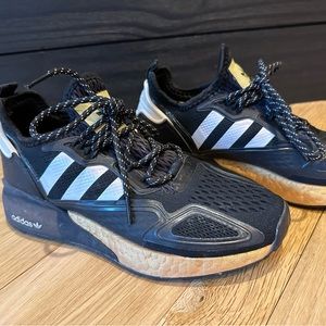 Adidas black and gold sneakers. Very stylish and comfortable.